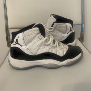 Color: mostly white with black, size: US youth 3.5, quality: used